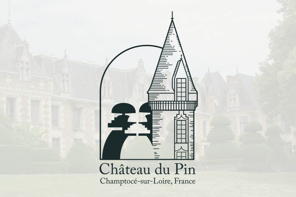 New logo for Château du Pin overlaid on a photo of the house